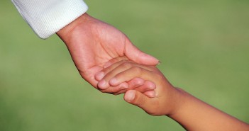 Mother Holding Child's Hand